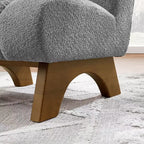 Poltrona accent Art Leon in tessuto pile polare con gambe in legno di caucciù